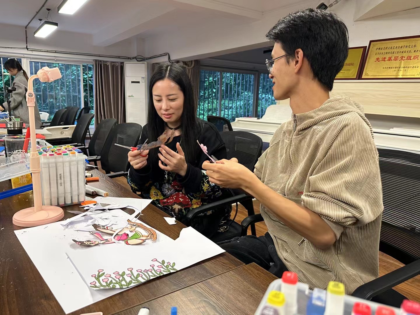 Art educator guiding a stop-motion workshop